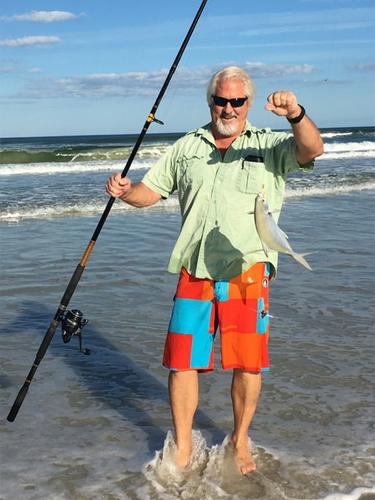 A happy surf fisher